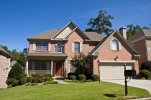 nice-brick-house-red-door-11568682.jpg