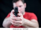dangerous-armed-man-pointing-hand-260nw-749776249.jpg