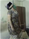 Mothers-body-hanging-from-ceiling-fan.png